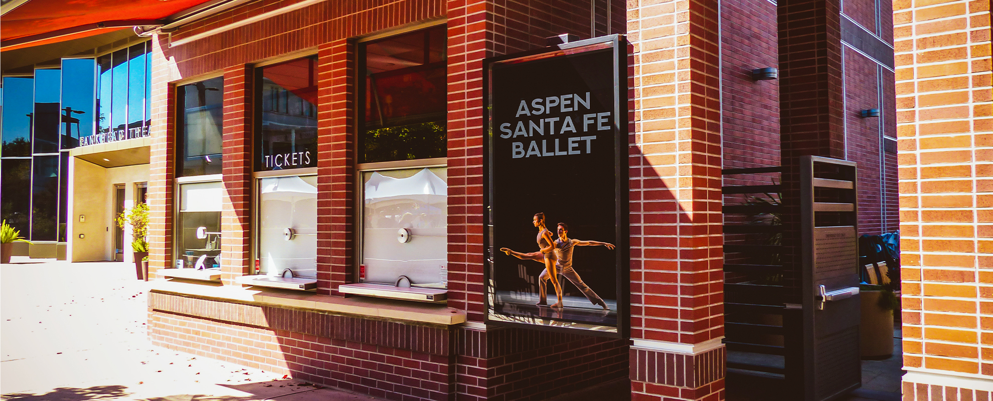 Digital displays behind the box office counter at Livermore Performing Arts Center.