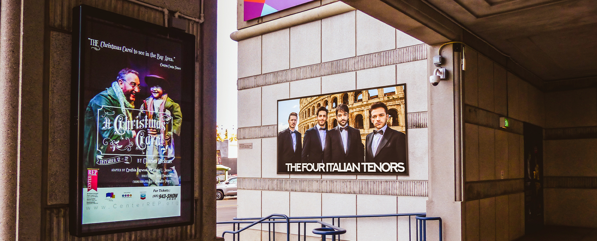 Outdoor digital marquee at a repertory theater.